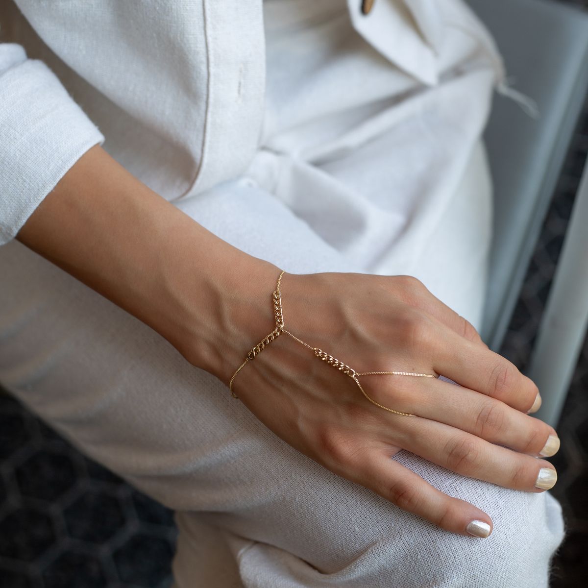 Close detail of a crystal hand chain